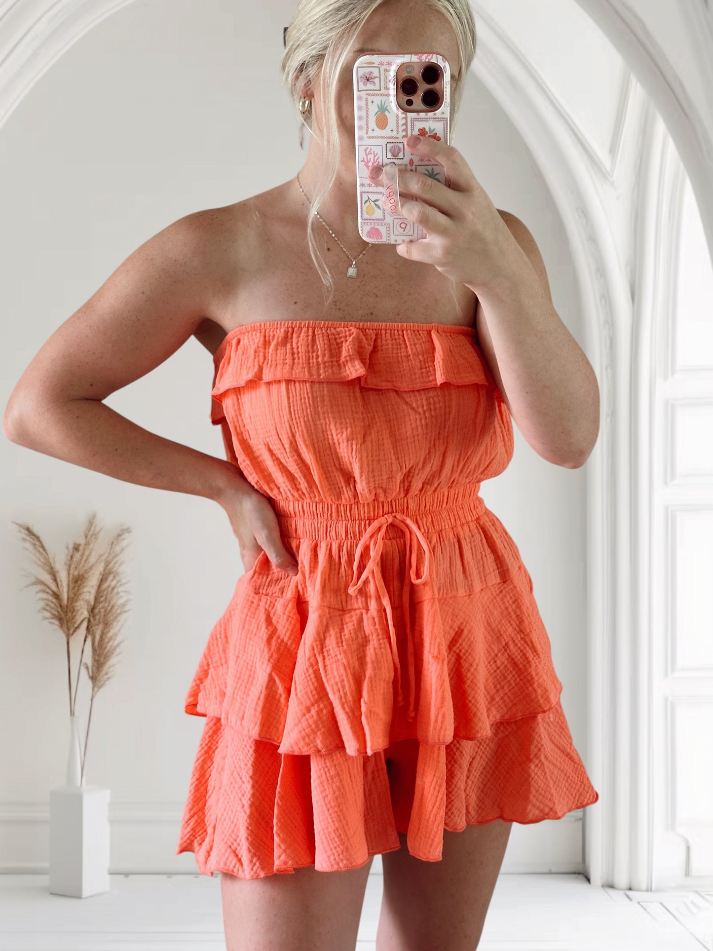 Hot Coral Strapless Ruffle Romper
