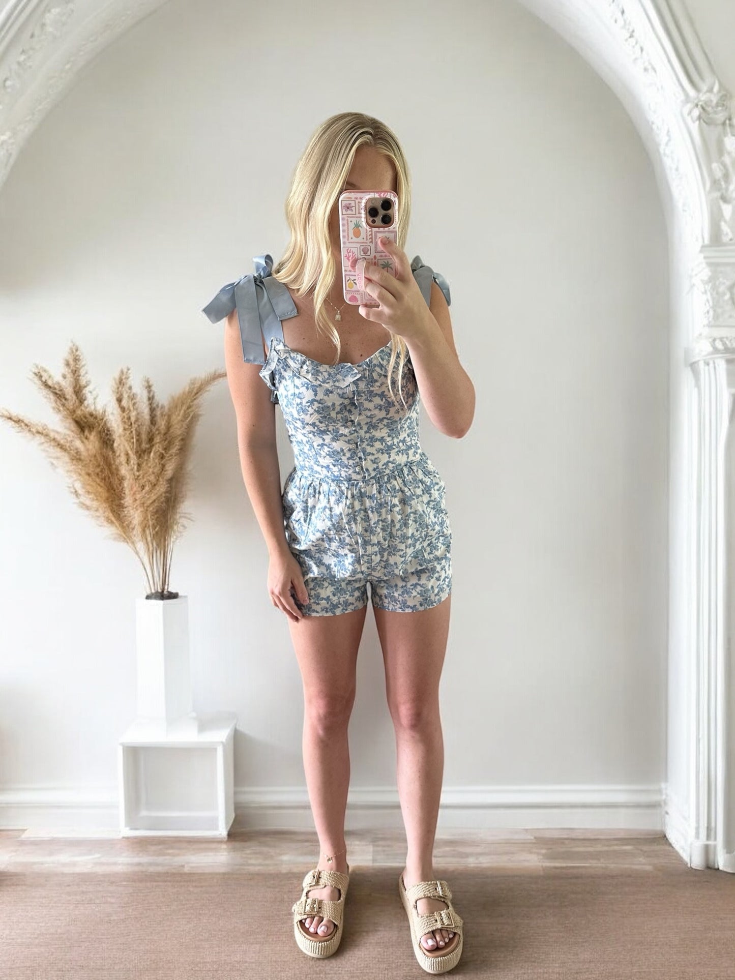 FLORAL SUMMER ROMPER WITH BOW STRAPS